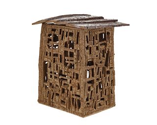 A Brutalist-style architectural stoneware sculpture