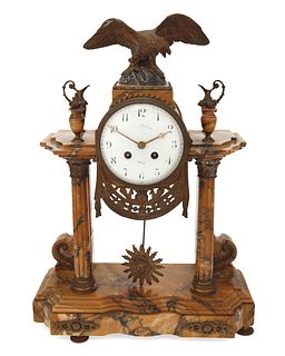 A French Empire-style marble mantle clock