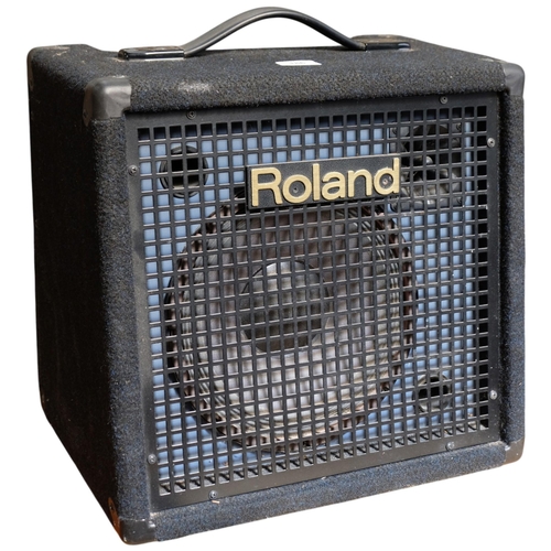 A Roland KC-60 EC guitar amplifier