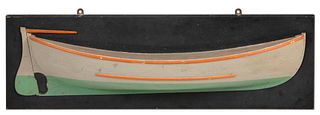 MOUNTED HALF HULL MODEL OF A MOTOR WHALEBOAT America, Circa 1920 Backboard 8.75" x 29".
